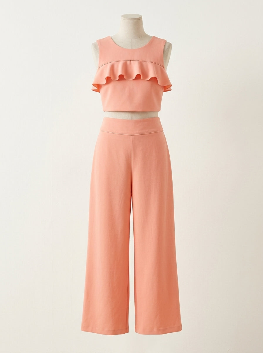Conjunto top volantes y pantalon melocoton