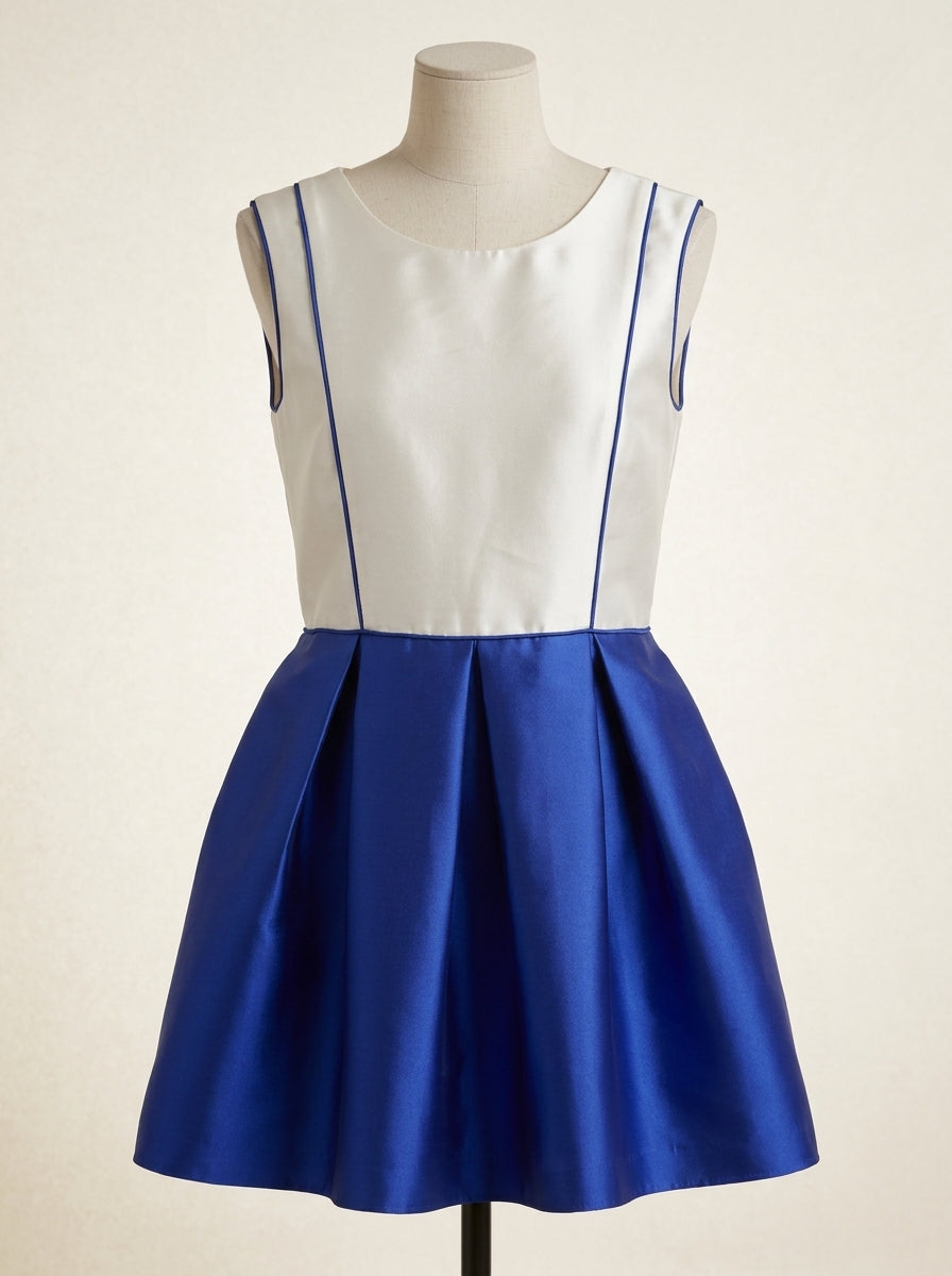 Vestido cuerpo mikado blanco y falda azulona