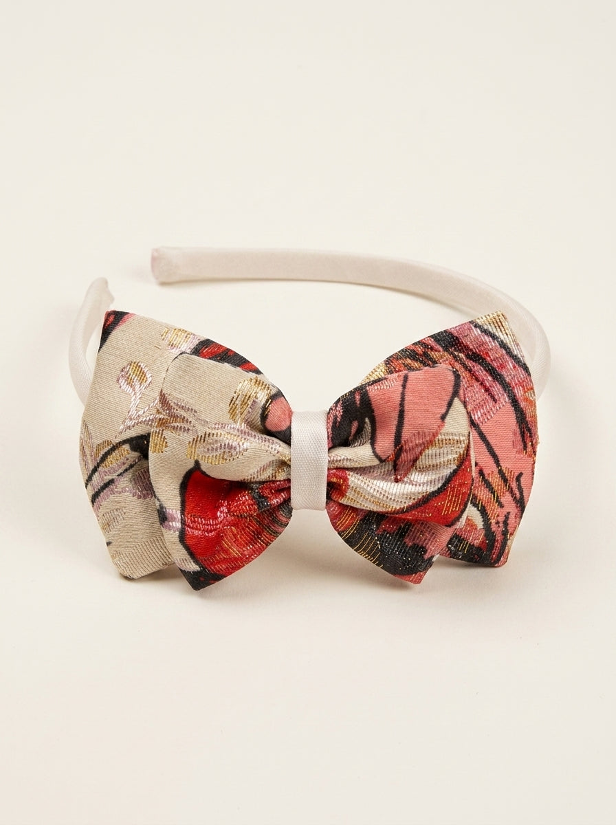 Diadema tonos rosas estampado
