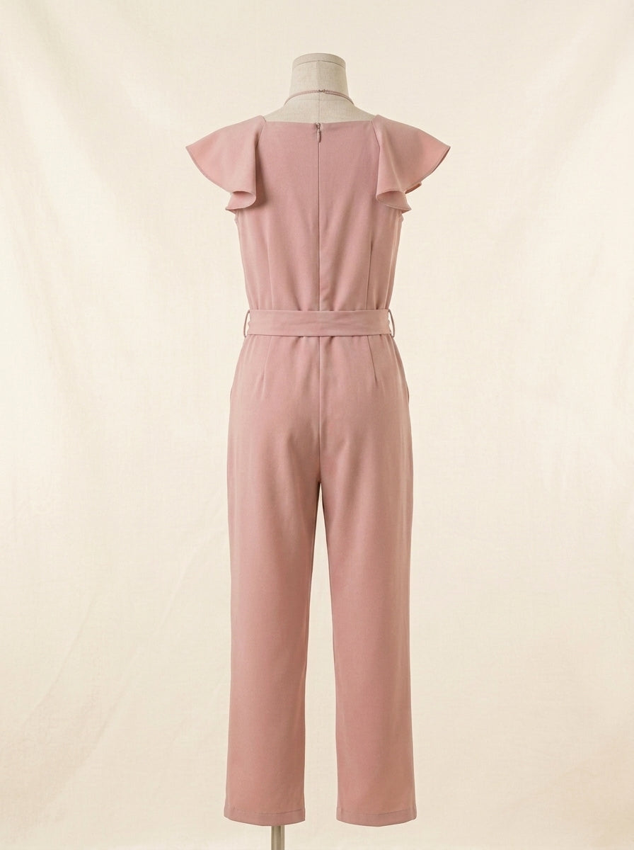 Mono rosa empolvado con volantes y collar
