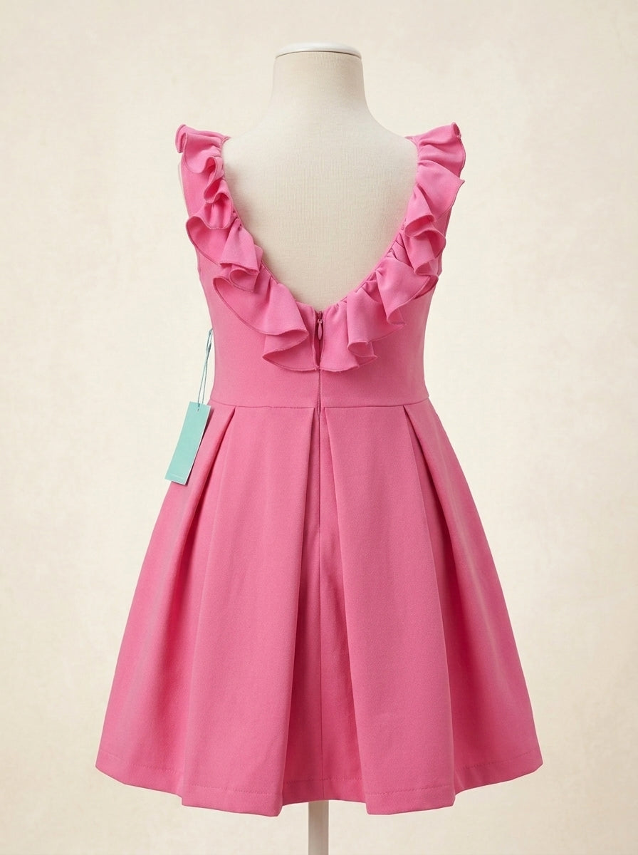 Vestido fucsia con volantes en la espalda