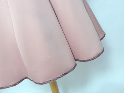 Vestido rosa empolvado con detalles morados y volante - PARDALETS