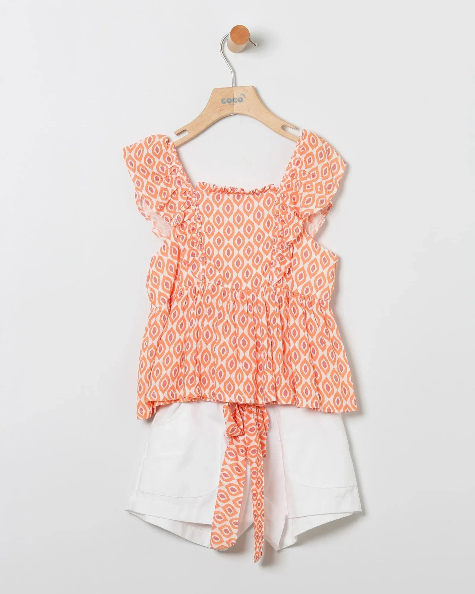 Conjunto blusa estampada naranja y short blanco - PARDALETS