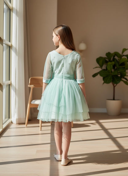 Vestido tul verde mint manga francesa con volantes