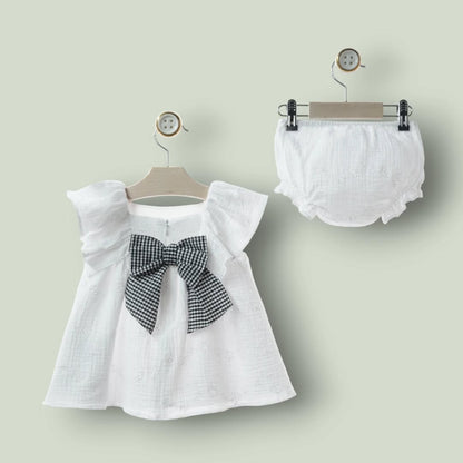 Vestido bordado blanco y lazo vichi negro "Ceramica"
