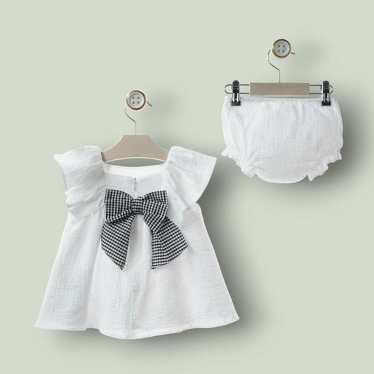 Vestido bordado blanco y lazo vichi negro "Ceramica"