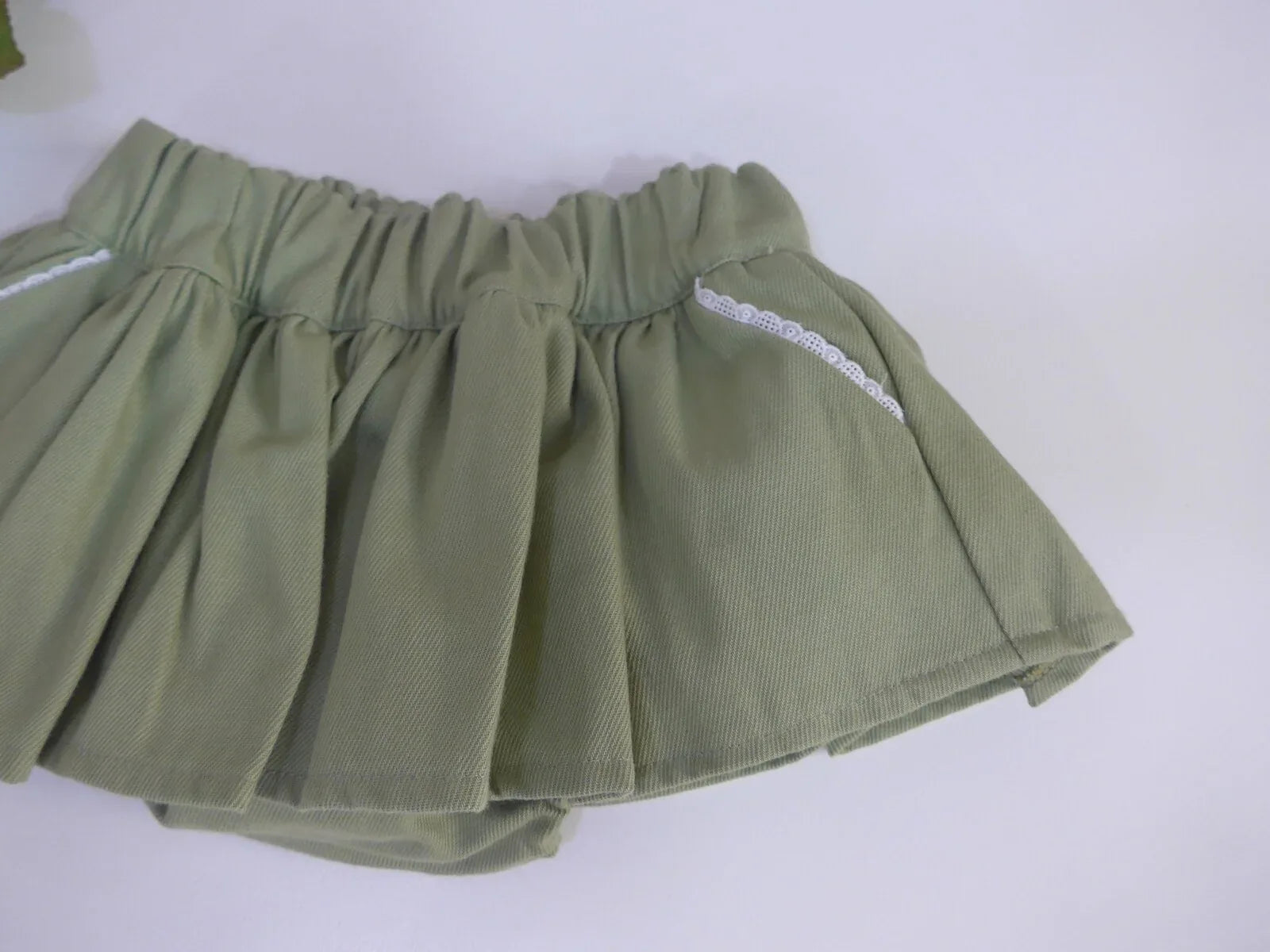 Braguita verde con volante - PARDALETS