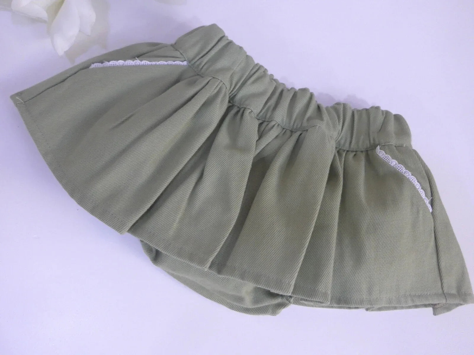 Braguita verde con volante - PARDALETS