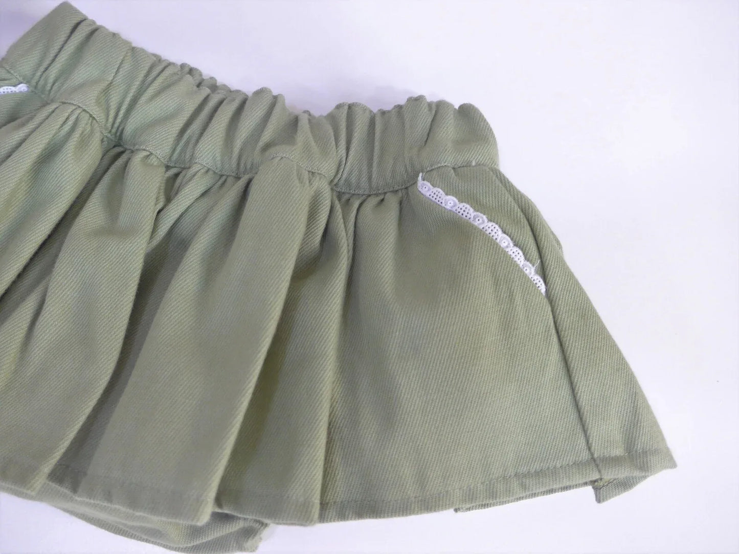 Braguita verde con volante - PARDALETS