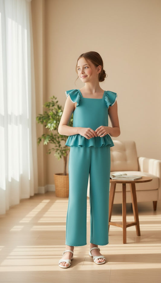 Mono verde esmeralda con volante en la cintura y lazo en la espalda