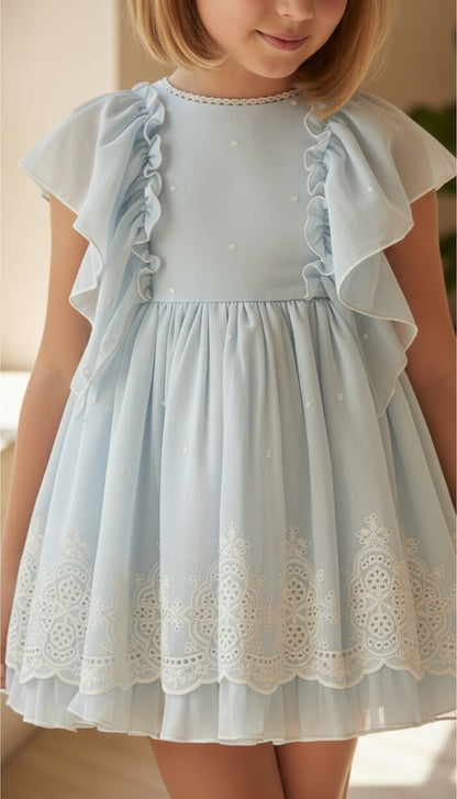 Vestido gasa bordada celeste con volantes