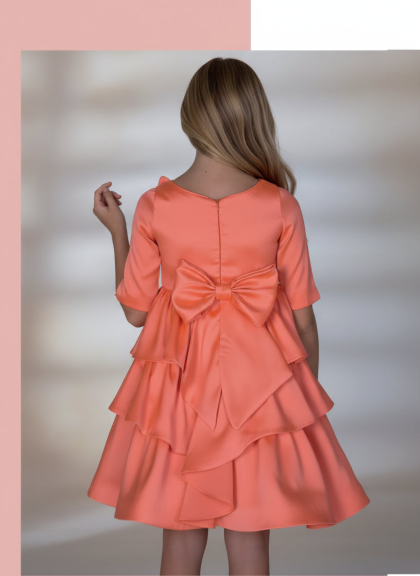 Vestido volantes naranja con flor