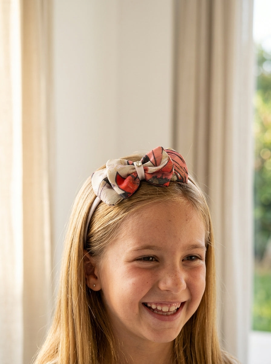 Diadema tonos rosas estampado