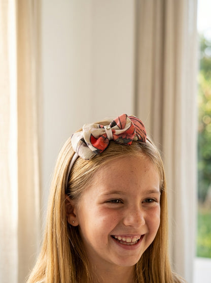Diadema tonos rosas estampado