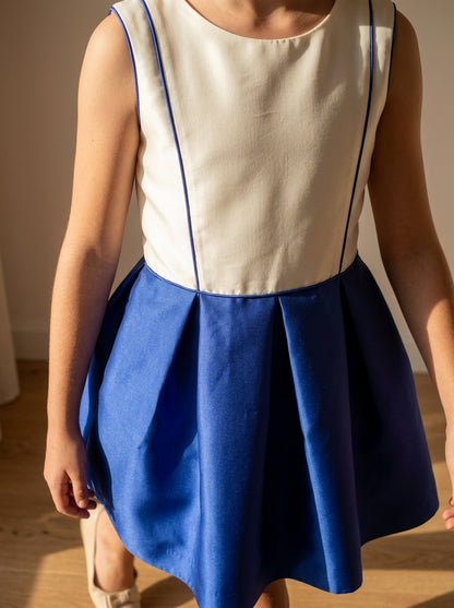 Vestido cuerpo mikado blanco y falda azulona