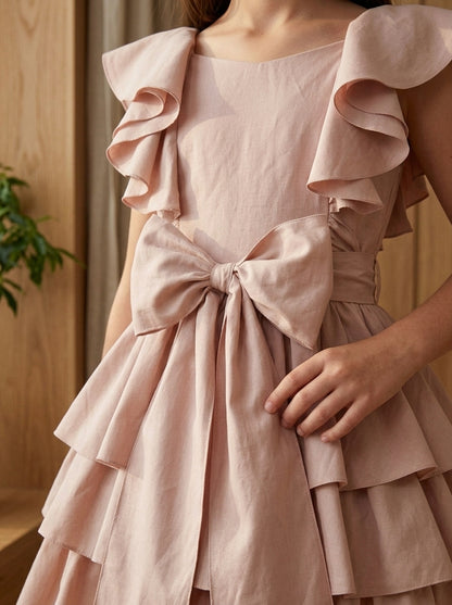 Vestido tafetan rosa maquillaje con volantes y lazada