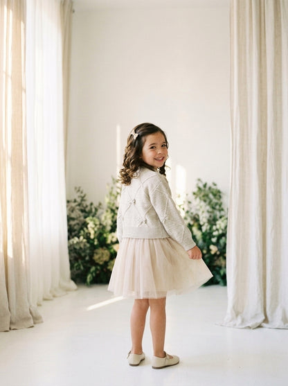 Conjunto vestido tul y jersey tostado con lazos y brillitos