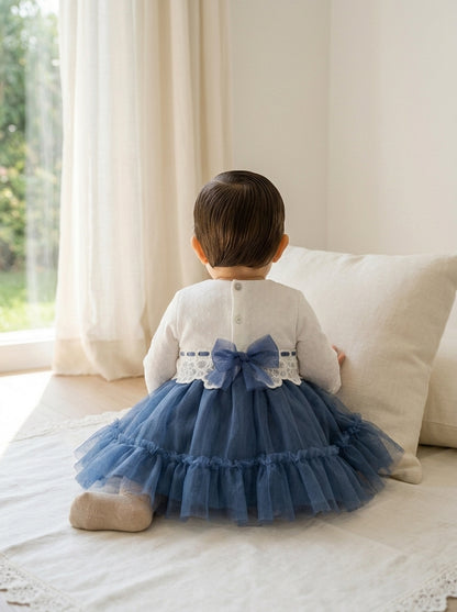 Vestido bebe tul beig y azul marino con volante