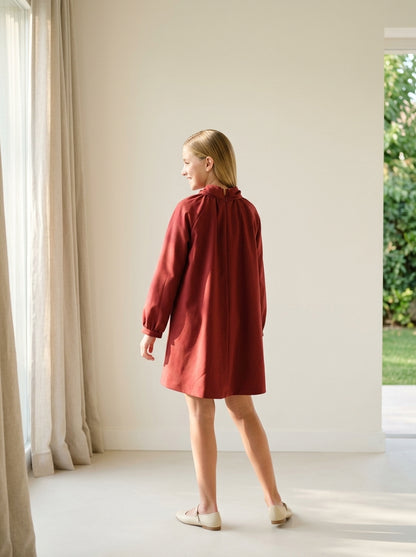 Vestido evase granate con lazada en el cuello