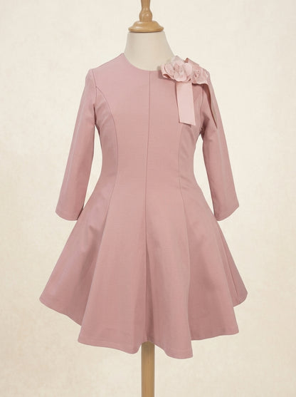Vestido punto roma rosa maquillaje detalle floral lateral