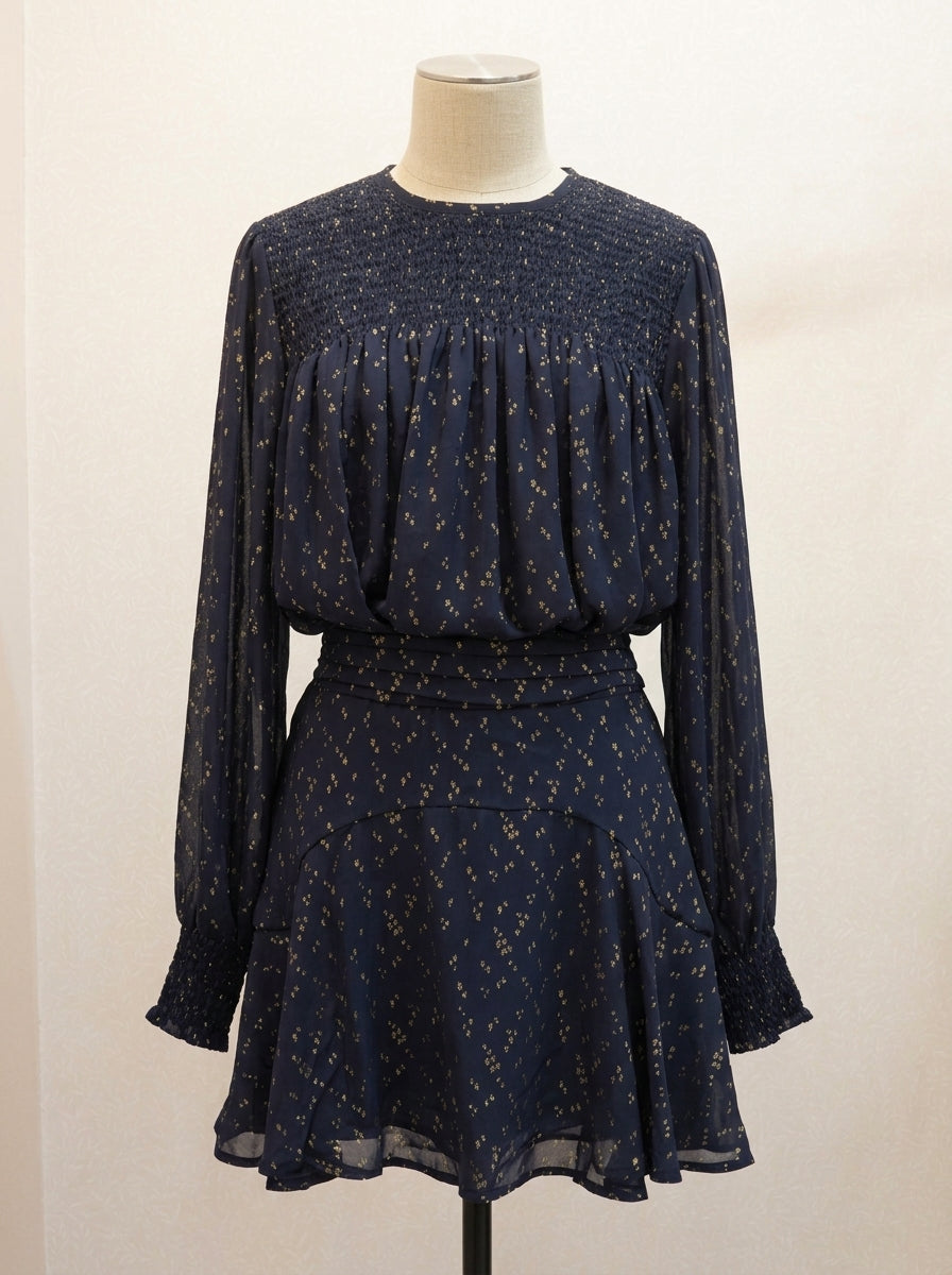 Conjunto blusa y falda gasa azul marino con detalles dorados