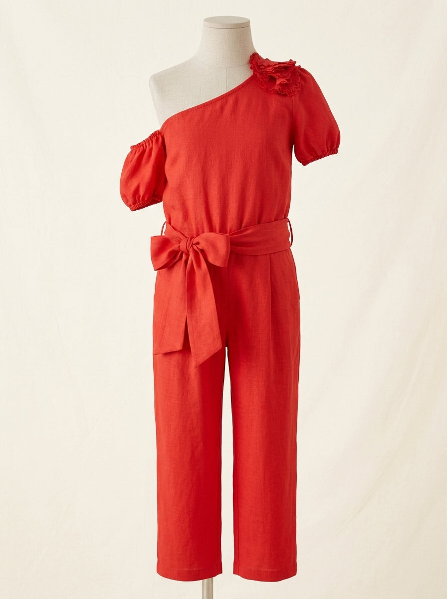 Mono rojo de pantalón largo y pompón