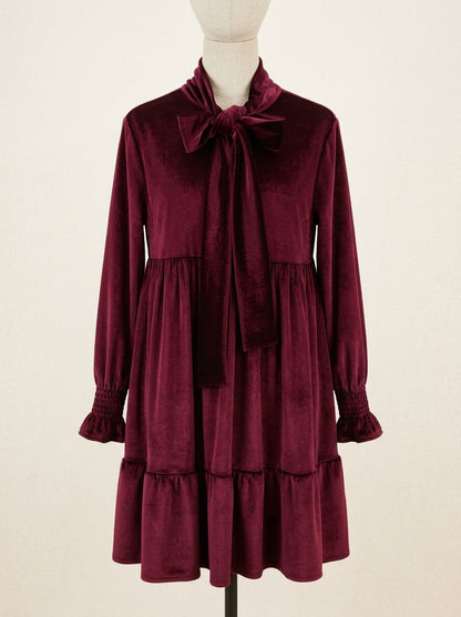 Vestido terciopelo granate con lazada en el cuello