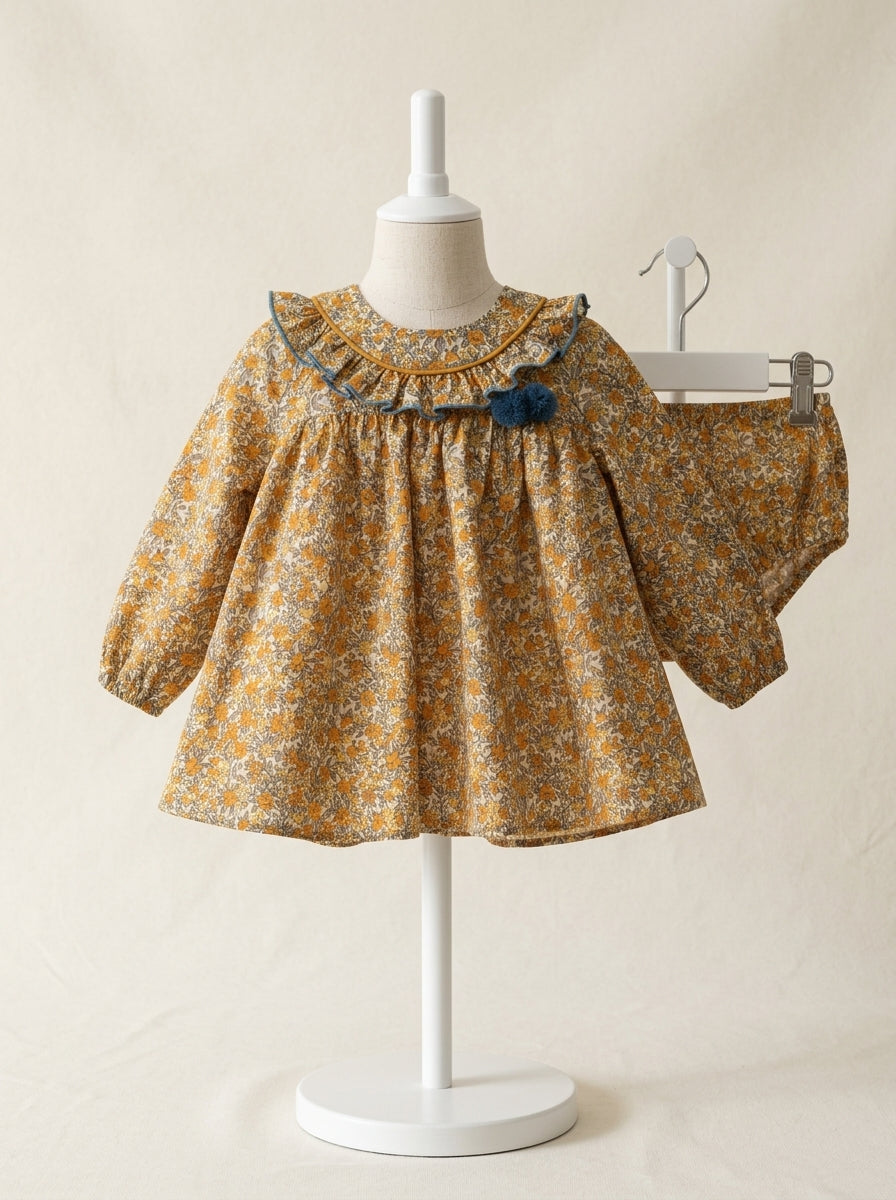 Vestido estampado flores turquesas y mostazas "Simba"