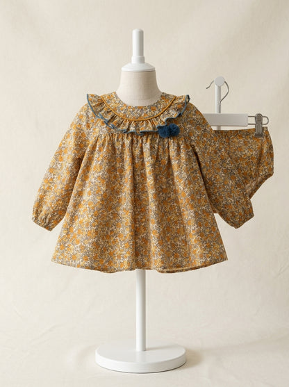 Vestido estampado flores turquesas y mostazas "Simba"