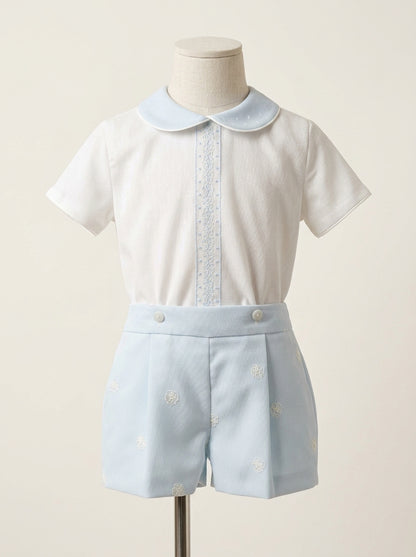 Conjunto camisa tul beig y detalles azules con bombacho bordado azul