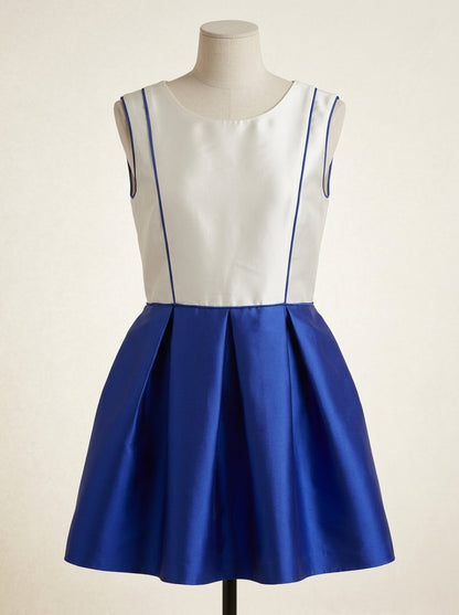 Vestido cuerpo mikado blanco y falda azulona