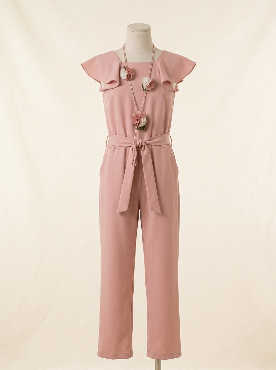 Mono rosa empolvado con volantes y collar