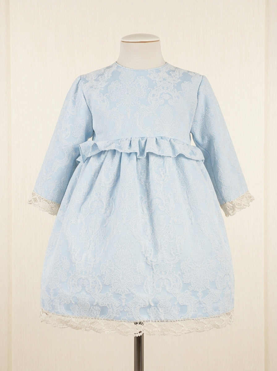 Vestido azul brocado con puntilla beig y gran lazada