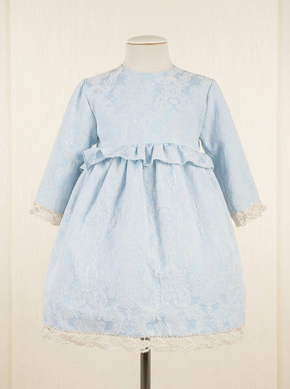 Vestido azul brocado con puntilla beig y gran lazada