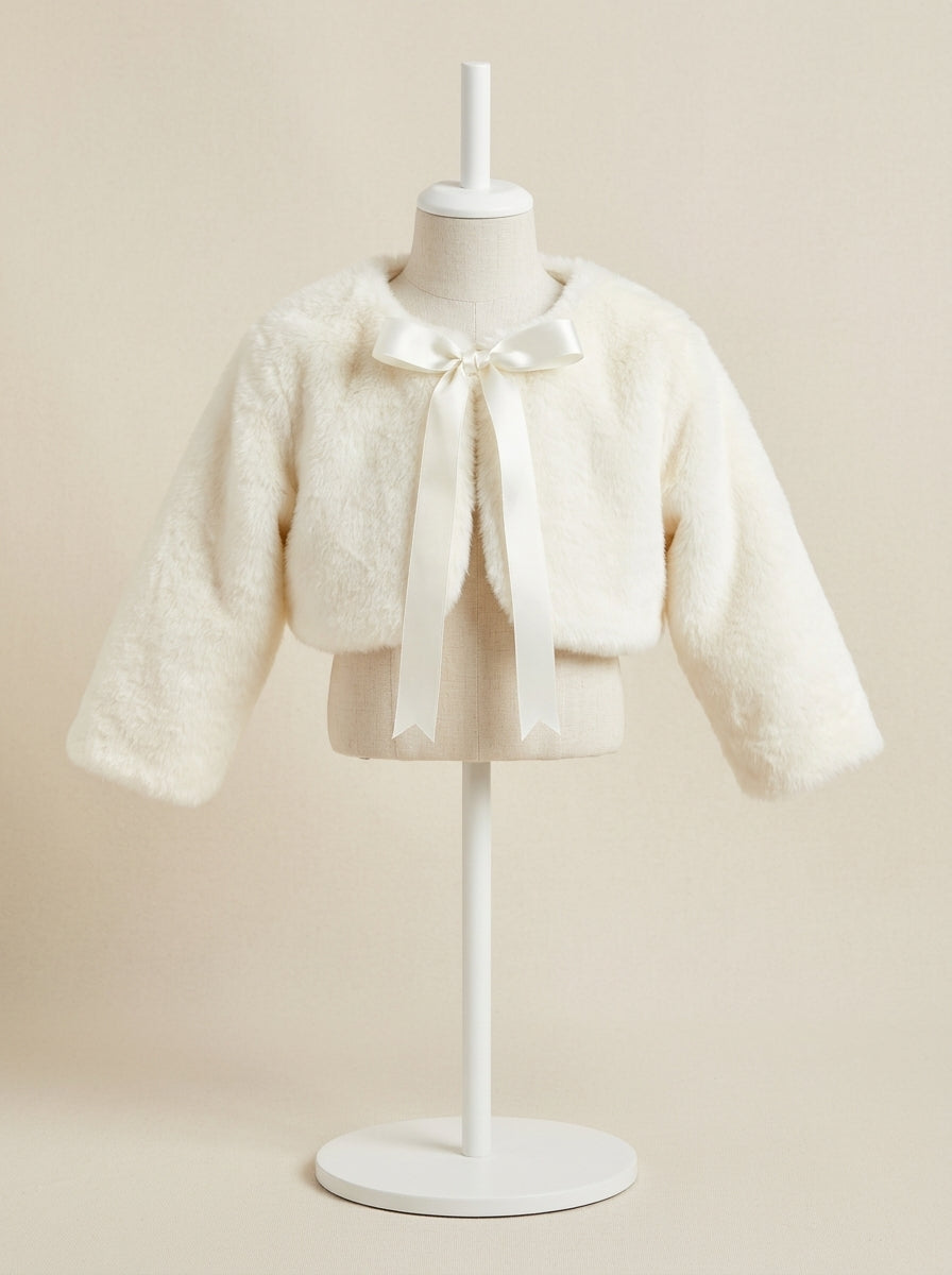 Bolero de peluche beige con lacito de raso