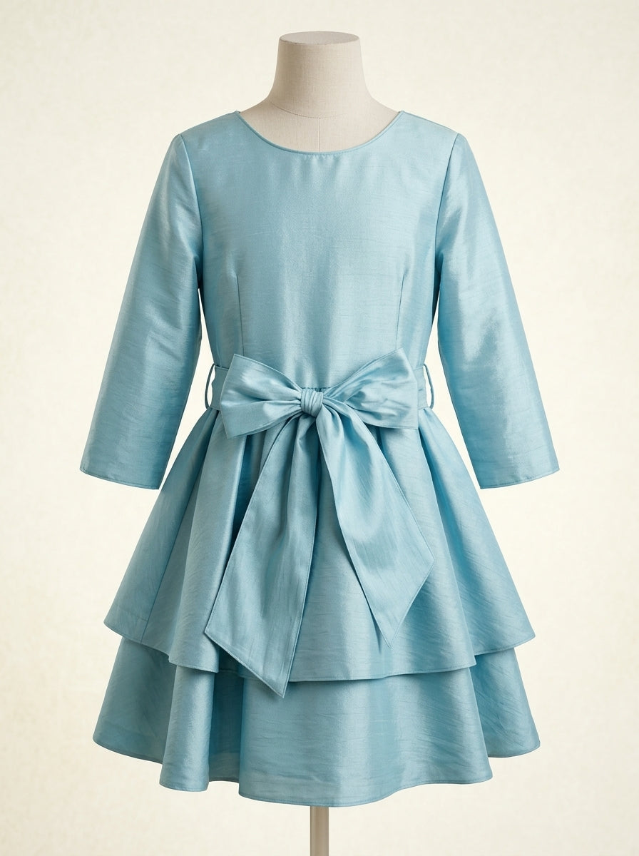 Vestido seda salvaje turquesa con volantes y manga francesa