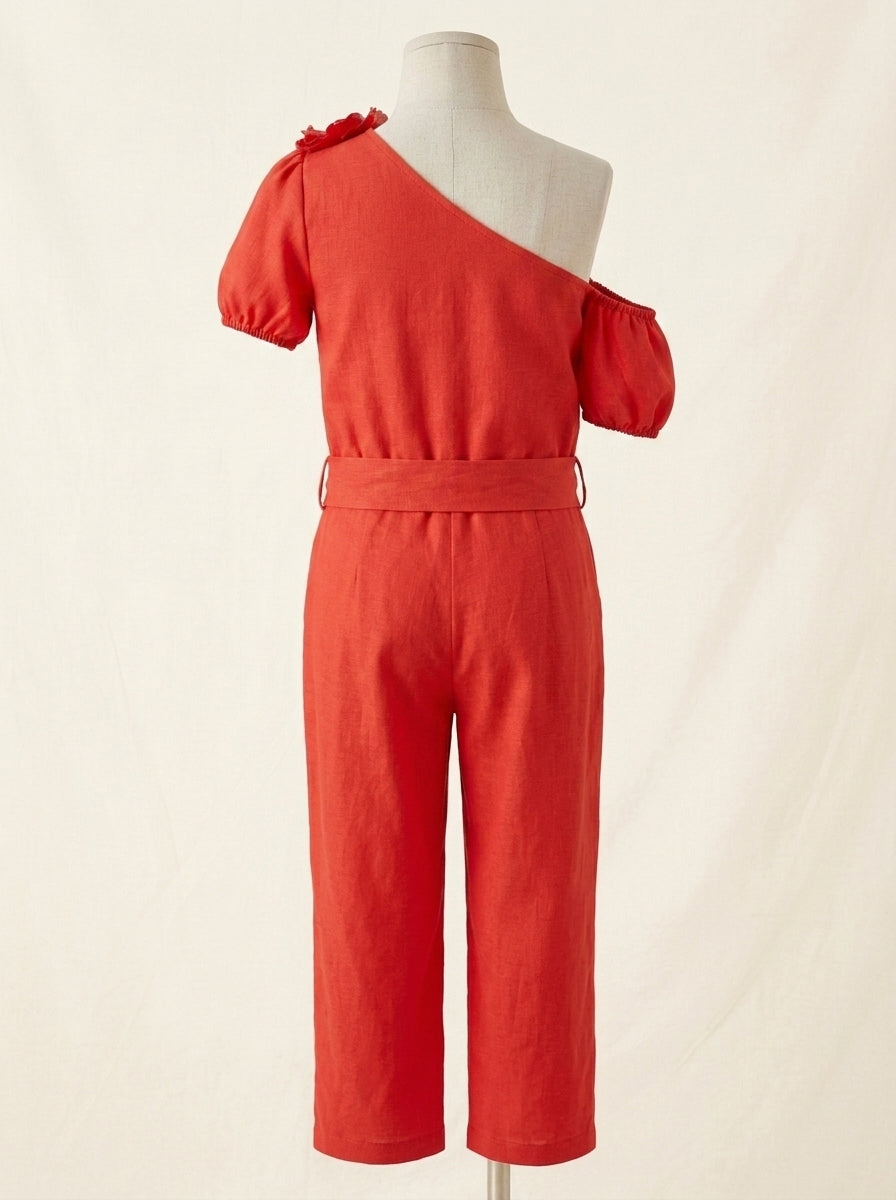 Mono rojo de pantalón largo y pompón