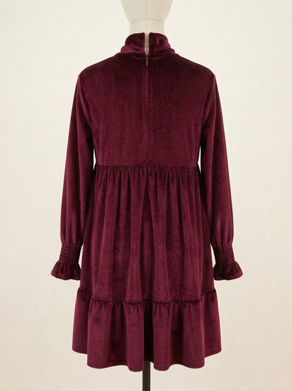 Vestido terciopelo granate con lazada en el cuello
