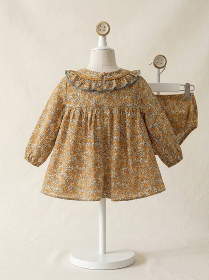 Vestido estampado flores turquesas y mostazas "Simba"