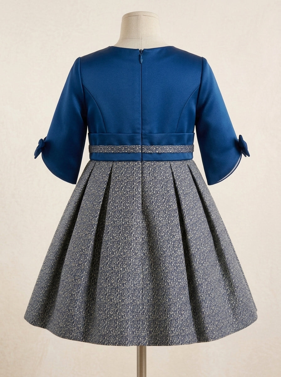 Vestido azul manga francesa con lazo y falda jaspeada