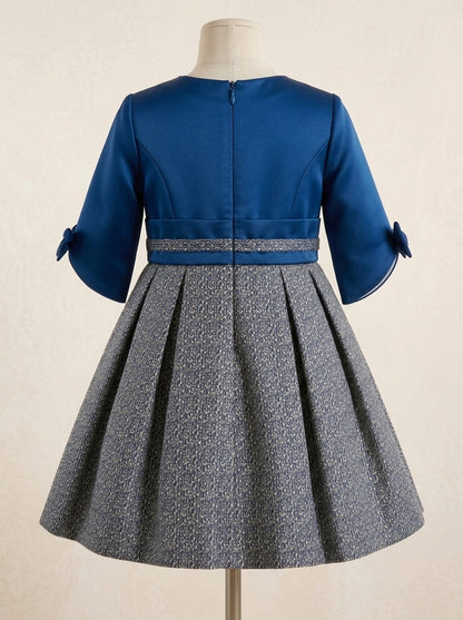 Vestido azul manga francesa con lazo y falda jaspeada
