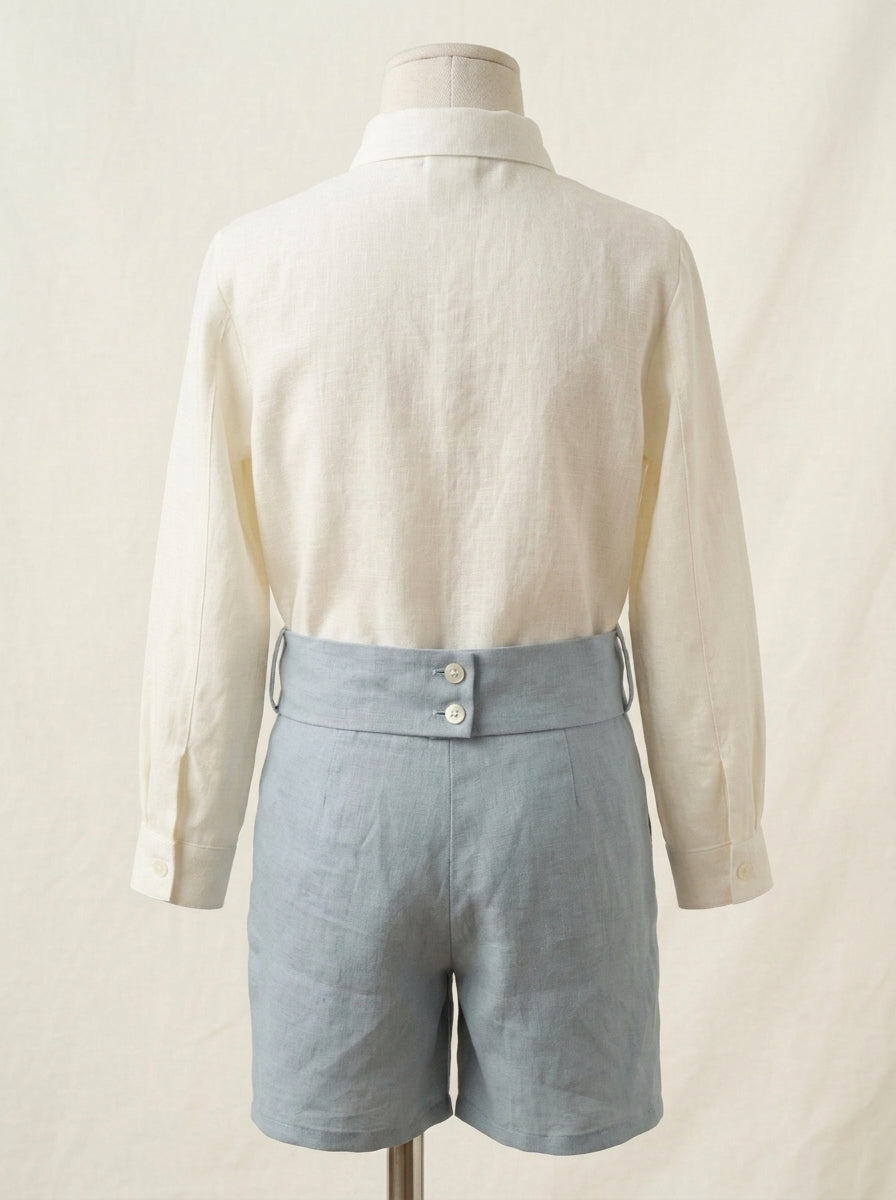 Conjunto camisa lino beig, short azul oceano con fajin y pajarita
