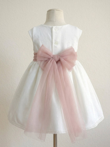 Vestido tul de plumeti con fajin rosa